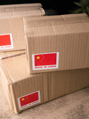 shipping cardboard box with MADE IN China flag label on.