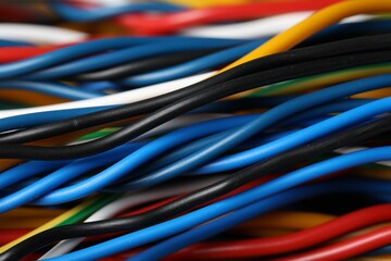 Many colorful electrical wires as background, closeup