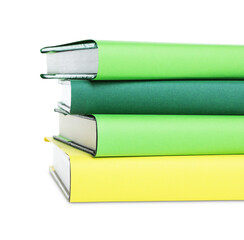 Stack of colorful books on white background