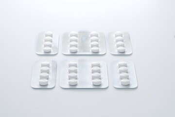 Organized Blister Packs and Tablets Neatly Arranged on a Surface