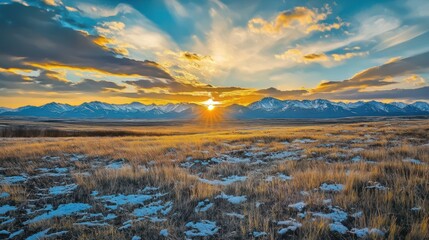 Obraz premium Serene vista of rolling fields meeting majestic mountains at sundown