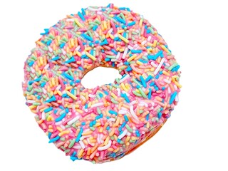 A sweet donut with colorful sprinkles sits against a white background, creating an isolated food image.