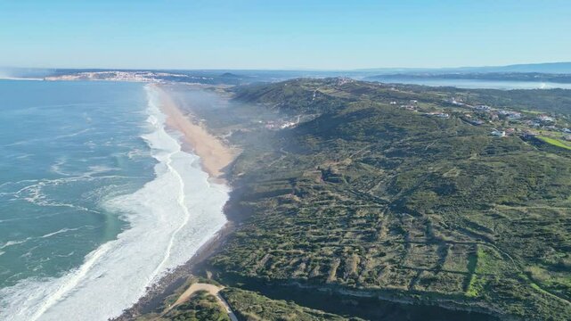 Beach and cliffs from miradouro do salgado in nazar&eacute;, portugal, aerial view
