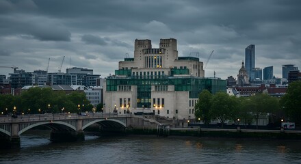 Obraz premium City Building View Across River with Bridge and Dark Sky