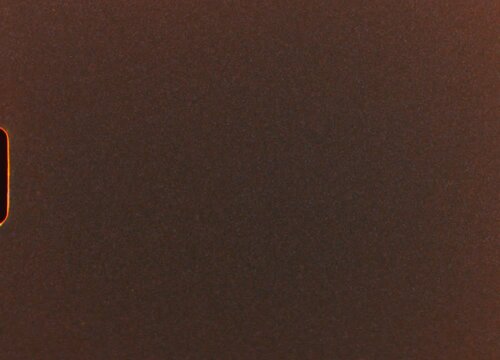 Light leaks, film burns, grain, artifacts, and other imperfections adorn this vintage super 8 film background, adding a touch of nostalgia and authenticity to any project