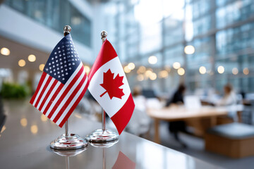 An USA and Canada flags displayed side by side in modern office, symbolizing equality and cooperative trading relationship