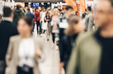 Abstract blurred people at exhibition hall of expo event trade show. Business convention show or job fair. Business concept background