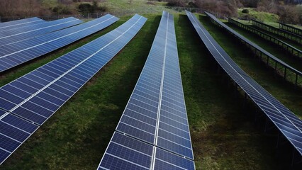 Solar panels installed in the countryside, harnessing renewable energy from the sun. Representing clean energy, sustainability, and the transition to Eco-friendly power solutions.