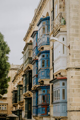 Fototapeta premium Valetta streets with coloured windows in Malta