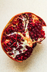 pomegranate on a wooden board close up