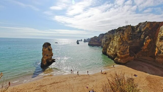 Stunning Golden Cliffs of Praia da Dona Ana Beach in Portugal's Algarve Region