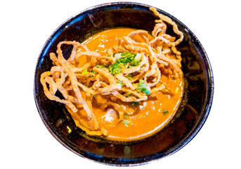 Top view of Northern Thai Curry Noodles with Chicken, focus selective