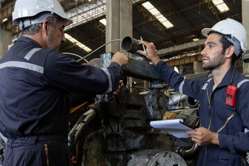 Engineer train engine service team working together at train depot locomotive industry Electric...