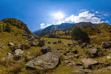Rocky Mountain Slope with Large Boulders Under Sun
