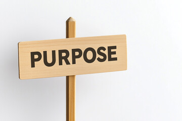 Wooden sign with the word "PURPOSE" in black font,  isolated on a white background 