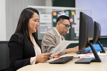 Office, and business people at desk working on computer. business group or entrepreneur working in office. Corporate, employee, and professional worker in corporate workplace