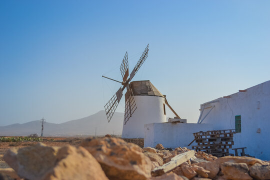 Spain, Fuerteventura, 16.12.2024: Windmills on the island that are being tried to be preserved due to their historical importance - Powered by Adobe