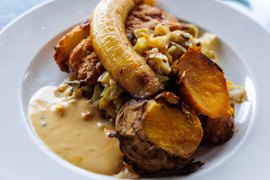 Black scabbardfish with banana and sweet potatoes in restaurant on Madeira Island in Portugal