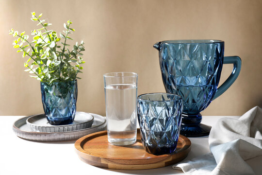 Blue faceted jug and glasses filled with water