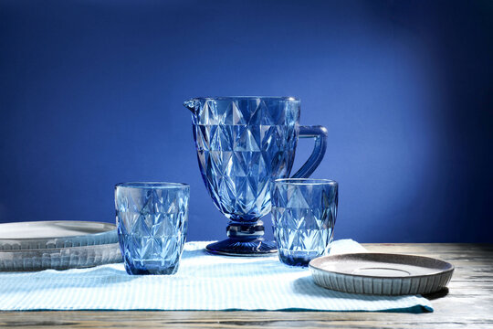 Faceted jug, glasses and plate