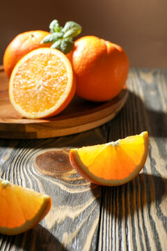 Sliced ​​ripe oranges with mint