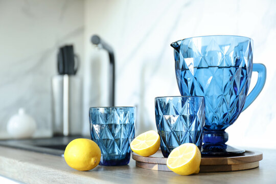 Blue faceted jug and glasses filled with water