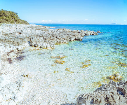 Janita Beach, &Scaron;i&scaron;an, Croatia: Rocky coastline meets clear turquoise water under a blue sky