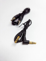 Two aux audio jack cables. Isolated on white background.