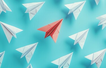 Aeroplanini di carta su uno sfondo azzurro