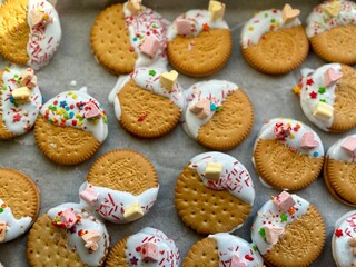 easter cookies decorated with sprinkles and marshmallows