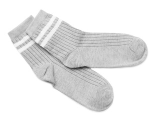 Pair of grey socks isolated on white, top view
