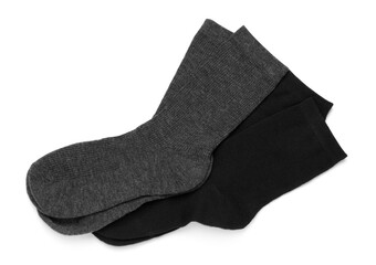 Pairs of stylish socks isolated on white, top view