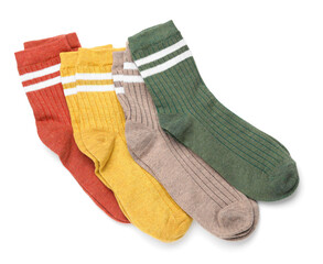 Many different pairs of socks isolated on white, top view