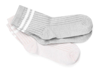 Pairs of stylish socks isolated on white, top view