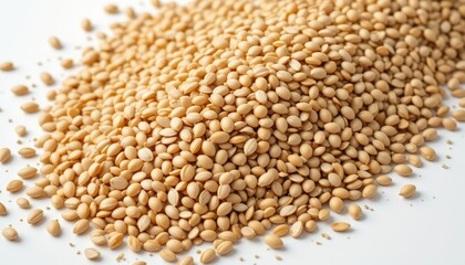 Close-up of a mound of golden sesame seeds, highlighting their texture and color, suitable for culinary, health, or food industry themes.