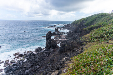 Rocks on ocean sea shore in tropical country