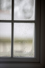 A window showing the rainy day outside.