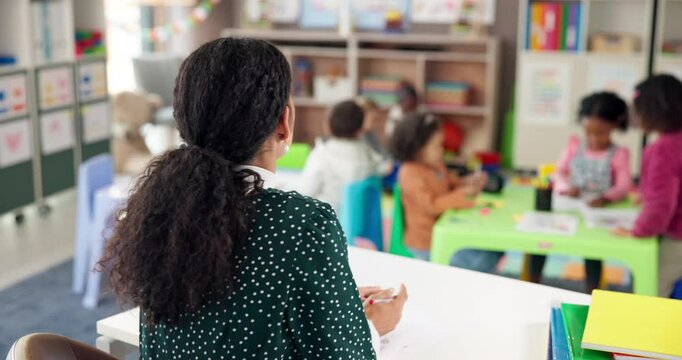 School, papers and teacher with children in classroom for lesson, learning and education. Students, teaching and educator with tests for grading and kids for early development, knowledge and progress