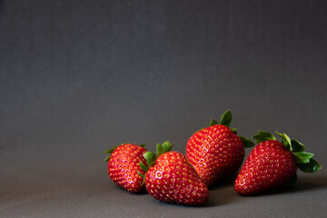 Fresh Ripe Strawberries on Dark Background