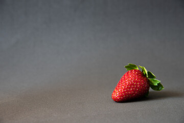 Fresh Ripe Strawberries on Dark Background