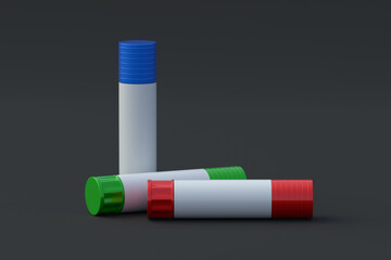 Colorful glue sticks on black background. School equipment. Office supplies. Accessories for handcraft. 3d render