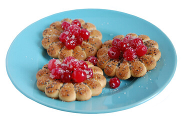 Cookies with berries on a blue plate
