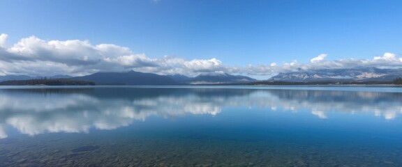 Fototapeta premium Serene Mountain Lake Reflection Picturesque Landscape of Calm Water and Majestic Peaks