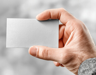 Hand holding blank business card on transparent background