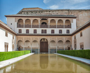 Fototapeta premium Alhambra, Granada, Spain: Alhambra's Court of the Myrtles with reflecting pool