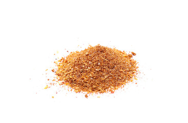 A pile of Mexican spice mixes (salt, paprika, garlic, tomatoes, chili peppers, cumin, coriander, oregano) isolated on a white background.