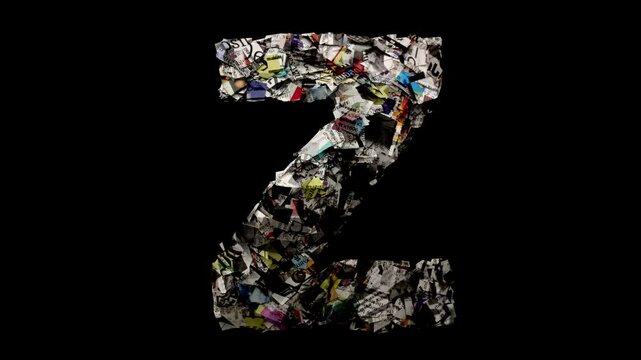 Letter Z with newspaper cuttings isolated on black 