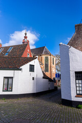 White walls of architectural complex which was housing beguines in Gent, Belgium