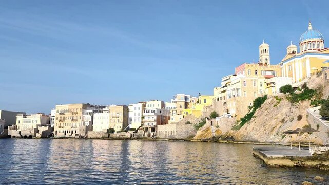 Picturesque view of Syros, a stunning Greek island in the Cyclades, nestled in the Aegean Sea, known for its neoclassical architecture, vibrant culture, and scenic coastal charm.