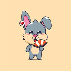 Cute rabbit cartoon vector illustration with hand fan